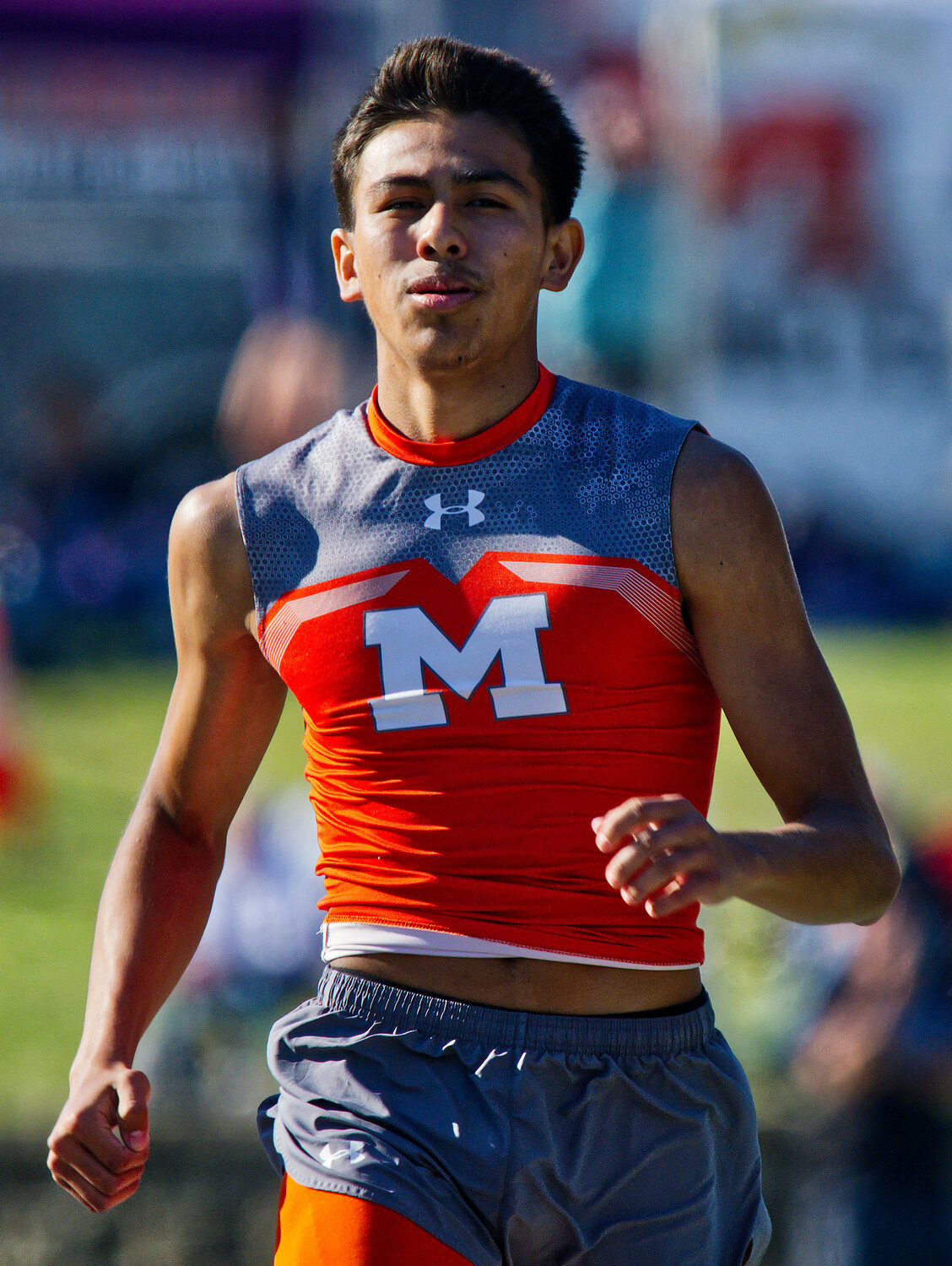 Jacob Lazano finishes the 400m run. [take in more track images]